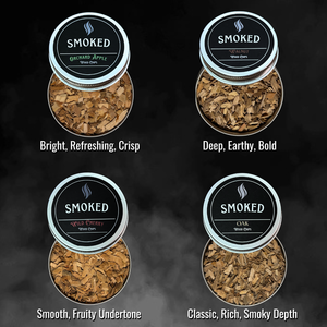 Four containers of smoked wood chips with labels and descriptions on a dark background.